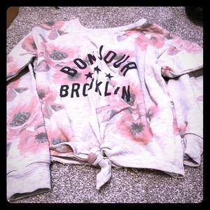 Long sleeve shirt with flowers and writing